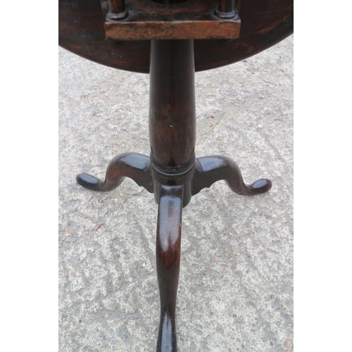 437 - A Georgian mahogany circular fan paterae inlaid tilt top table, on birdcage and turned column tripod... 