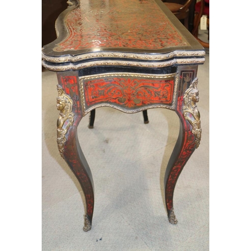 439 - A 19th century Boulle work serpentine front fold-over top card table with gilt brass mounts, on cabr... 