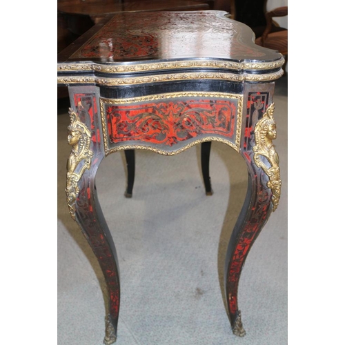 439 - A 19th century Boulle work serpentine front fold-over top card table with gilt brass mounts, on cabr... 