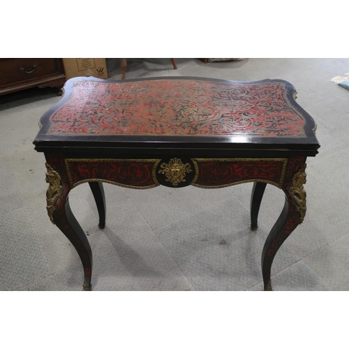 439 - A 19th century Boulle work serpentine front fold-over top card table with gilt brass mounts, on cabr... 