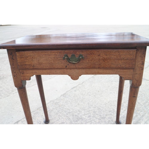 443 - A late Georgian mahogany side table, fitted one drawer, on turned supports and pad feet, 28