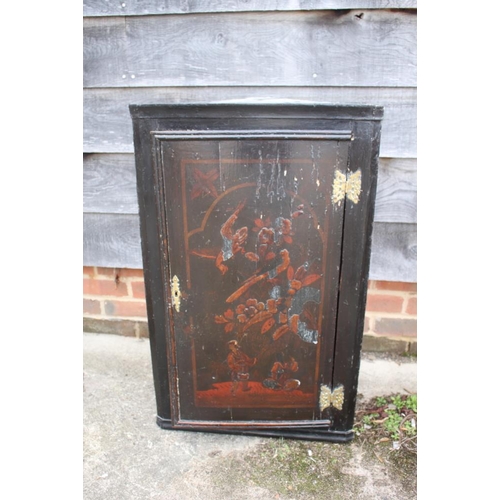 449 - An early 18th century chinoiserie lacquer decorated corner cupboard enclosed panel door, 20 1/2