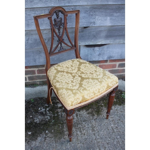 450 - A late Victorian walnut side chair with pierced splat and stuffed over seat, on turned supports