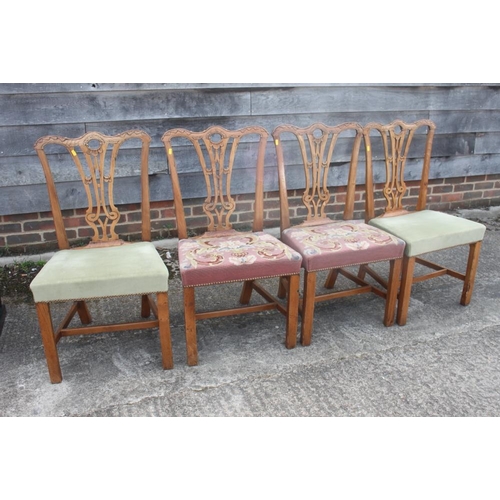 453 - A set of four late Georgian carved ash and fruit wood side chairs with stuffed over seats and pierce... 