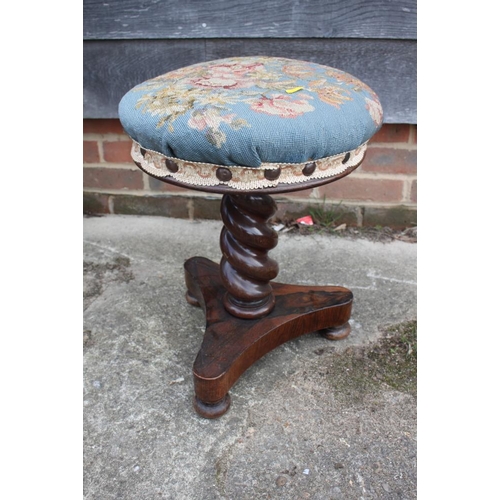 456 - A Victorian rosewood piano stool with adjustable circular needlepoint seat, on spiral turned column ... 