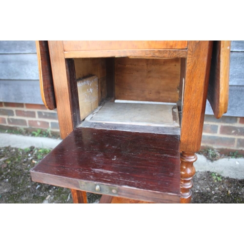 470 - A 19th century burr yew and rosewood banded flap top bedside table, fitted one drawer and cupboard, ... 