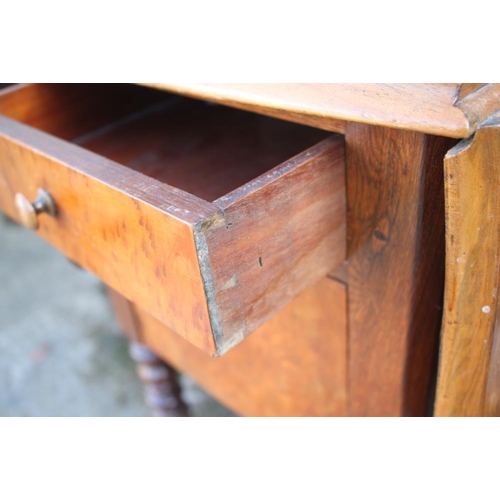 470 - A 19th century burr yew and rosewood banded flap top bedside table, fitted one drawer and cupboard, ... 