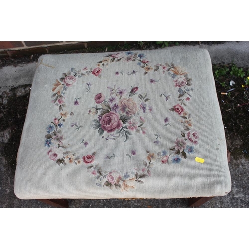 476 - A 19th century stool with needlepoint seat, on square taper and stretchered supports, 13