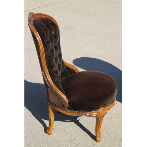 537 - A pair of carved and polished as walnut showframe low-seat nursing chairs, button upholstered in a c... 