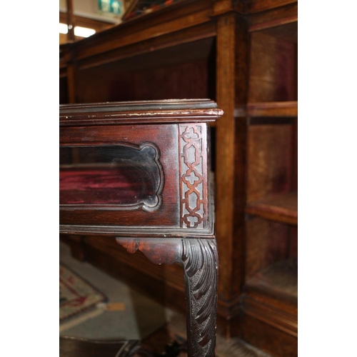 592 - An Edwardian carved mahogany display table, on slender tapering supports united by 'X' stretcher and... 