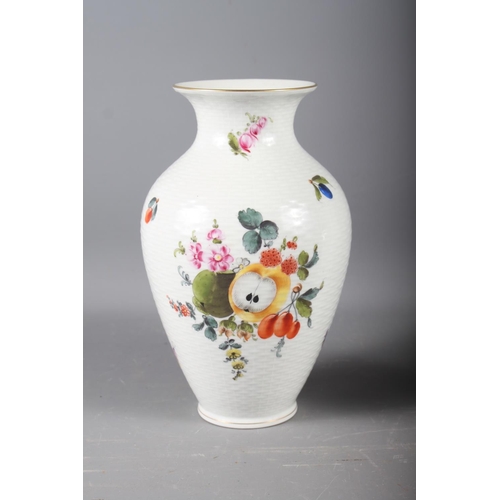 97 - A Herend baluster vase with fruit and flower decoration on a canework ground, 9