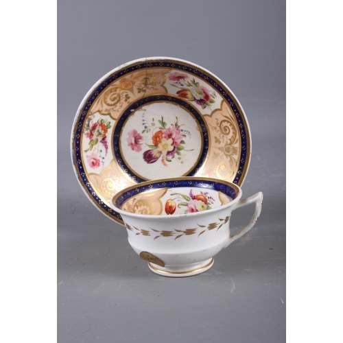 11 - A 19th century Derby cabinet cup and saucer with landscape panels and gilt scroll work borders (craz... 