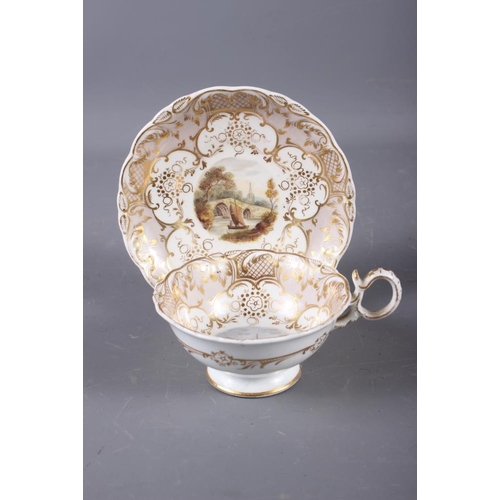 11 - A 19th century Derby cabinet cup and saucer with landscape panels and gilt scroll work borders (craz... 