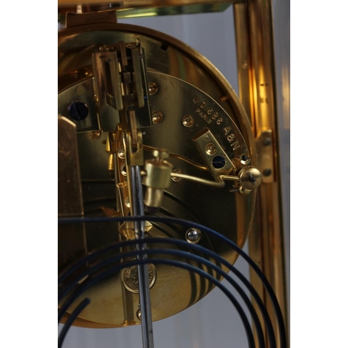 135 - A French brass four-glass mantel clock with striking movement and mercury pendulum by A D Hougin, 10... 