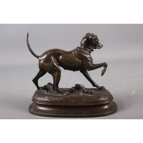 155 - Auguste Guillon: A 19th century Animalier bronze model of a pointer bitch, on oval base, 6 3/4