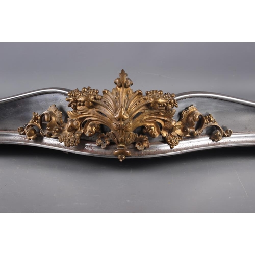 157 - A mid 19th century burnished steel and gilt brass scroll fender curb with integral implement rests, ... 