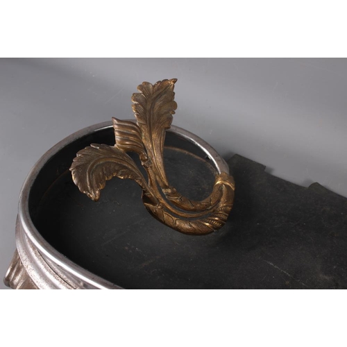 157 - A mid 19th century burnished steel and gilt brass scroll fender curb with integral implement rests, ... 