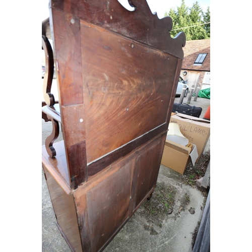 417 - A Regency mahogany chiffonier, fitted two open shelves over fabric fronted cupboards, on turned supp... 