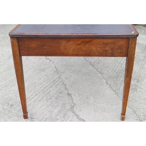 441 - A late 19th century oak and mahogany rectangular library table with inset leather top over one long ... 