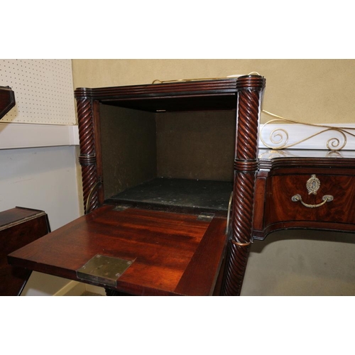 484 - A Regency mahogany and ebony line inlaid inverse break bow drop centre sideboard with brass scroll r... 