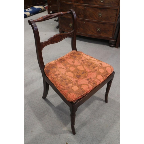 486 - A set of seven 19th century mahogany side chairs with loose seat squabs, oval carved bar backs and r... 