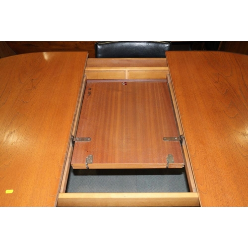 596 - A G-Plan teak 'D' end extending dining table, 83