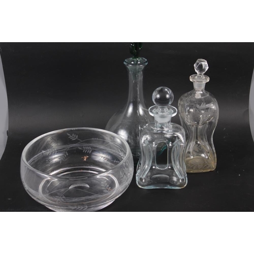 83 - Two hourglass decanters and stoppers, a cut glass bowl and a modern decanter