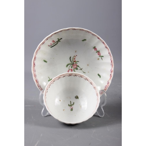 9 - A Newhall (Factory X) cream jug (hair crack) and a pair of similar fluted tea bowls and saucers (fri... 