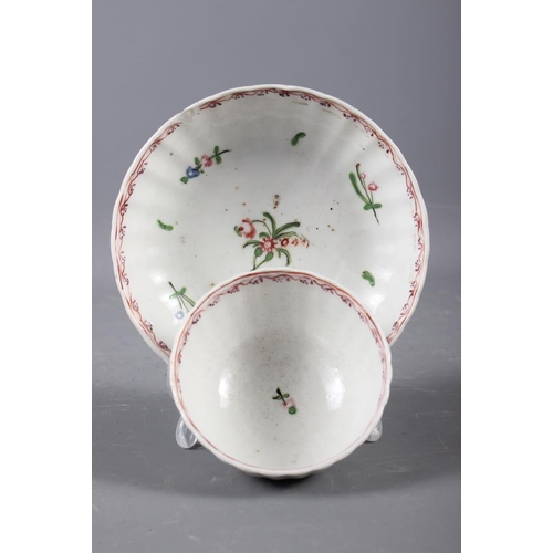 9 - A Newhall (Factory X) cream jug (hair crack) and a pair of similar fluted tea bowls and saucers (fri... 