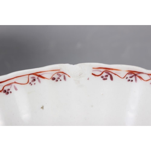 9 - A Newhall (Factory X) cream jug (hair crack) and a pair of similar fluted tea bowls and saucers (fri... 