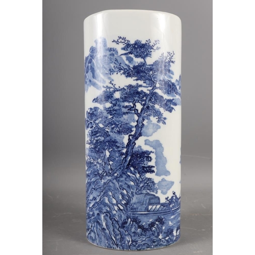 107 - A Japanese blue and white oval shaped vase, decorated trees and figures in a boat (hairline crack), ... 