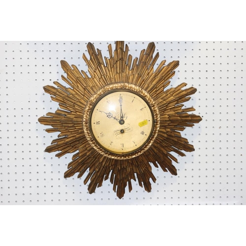 129 - A Cray Pond giltwood sunburst clock with eight-day movement, gilt dial and Roman numerals, 17