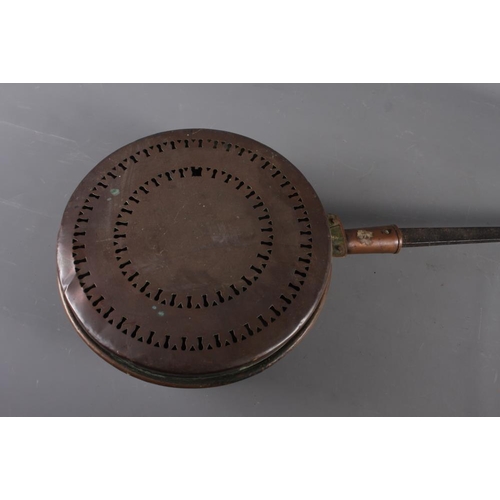 140 - A copper plague pan, a quantity of brass table lamps, light fittings, bellows and other items