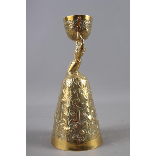 152 - A brass wager cup, 8 1/2