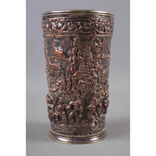 152 - A brass wager cup, 8 1/2