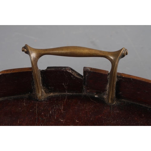 162 - A mahogany oval galleried tray with brass handles, 28