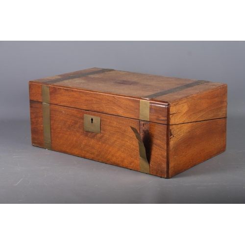 167 - An early 20th century walnut and brass bound writing box, 15 3/4