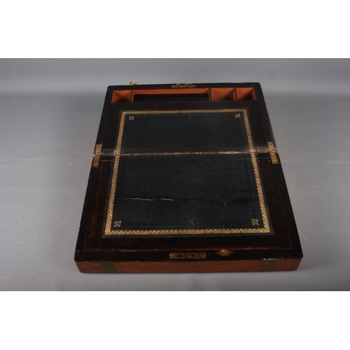 167 - An early 20th century walnut and brass bound writing box, 15 3/4