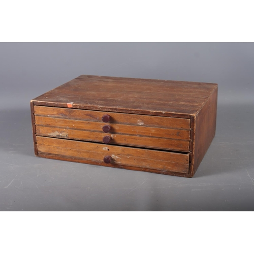 168 - A collector's pine coin box, fitted four drawers, 14 1/4