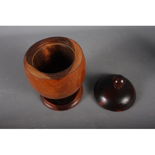 174 - A lignum vitae jar and cover, 7