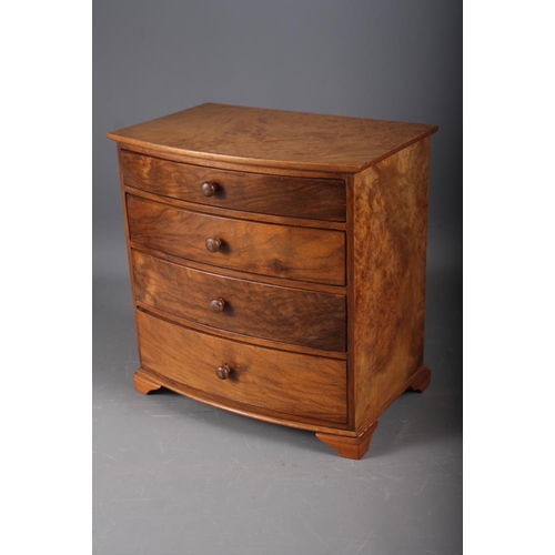 178 - A burr walnut miniature bowfront chest of four long  graduated drawers, on bracket supports, 9 1/2