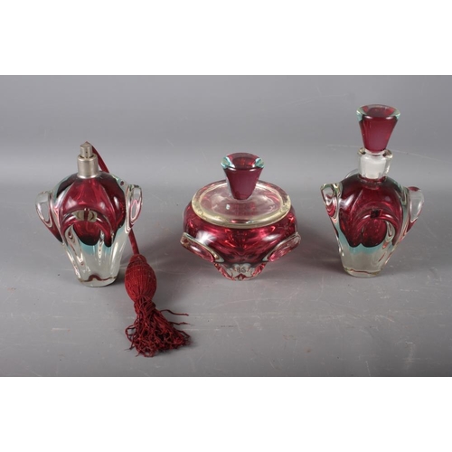 18 - Three French Val St Lambert type dressing table items, comprising a scent bottle and stopper, a jar ... 