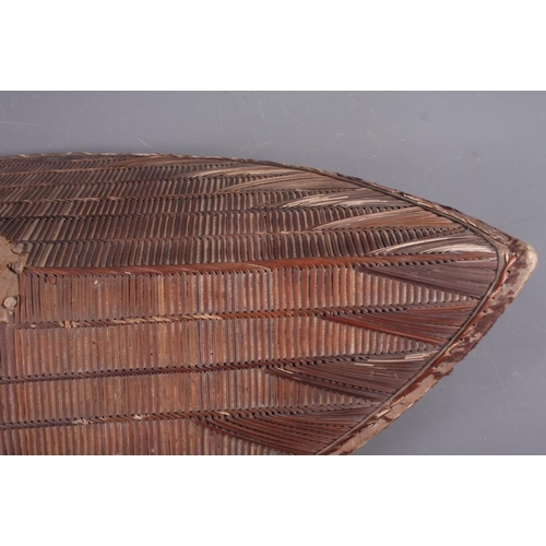 191 - Two Ganda shields with traditional woven rattan design and  fur borders, 30