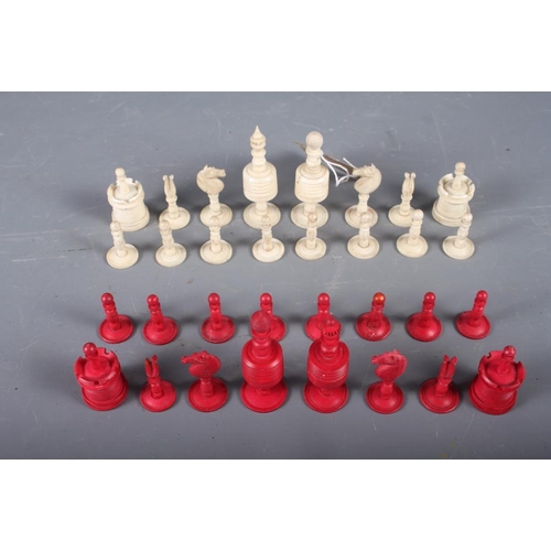 194 - A turned stained bone chess set (some damages)