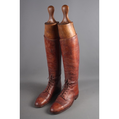 201 - A pair of brown leather riding boots, length from heel to toe, 12