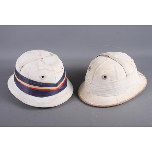 202 - A mid 20th century polo helmet, by Holbrow, and another by Walter Holbrow & Sons Ltd