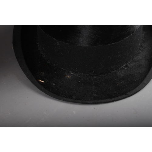 208 - A Henry Heath Ltd black silk top hat, 8