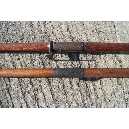 215 - A pair of early 20th century rowing blades, Cambridge blue, 109