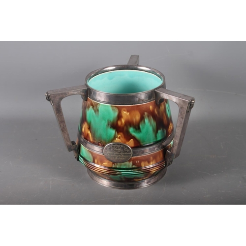 291 - A Wedgwood majolica green and brown glazed tyg jug with silver plated Egyptian Revival mounts, 6 1/2... 