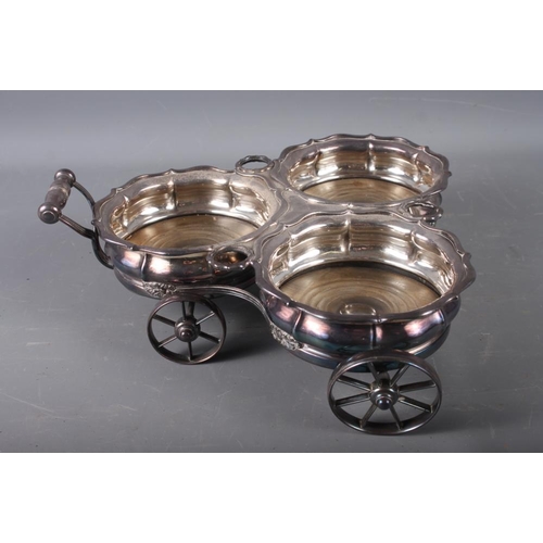 299 - A 19th century silver plated decanter wagon, for three decanters 14